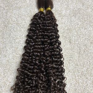 100% human hair extensions / curly